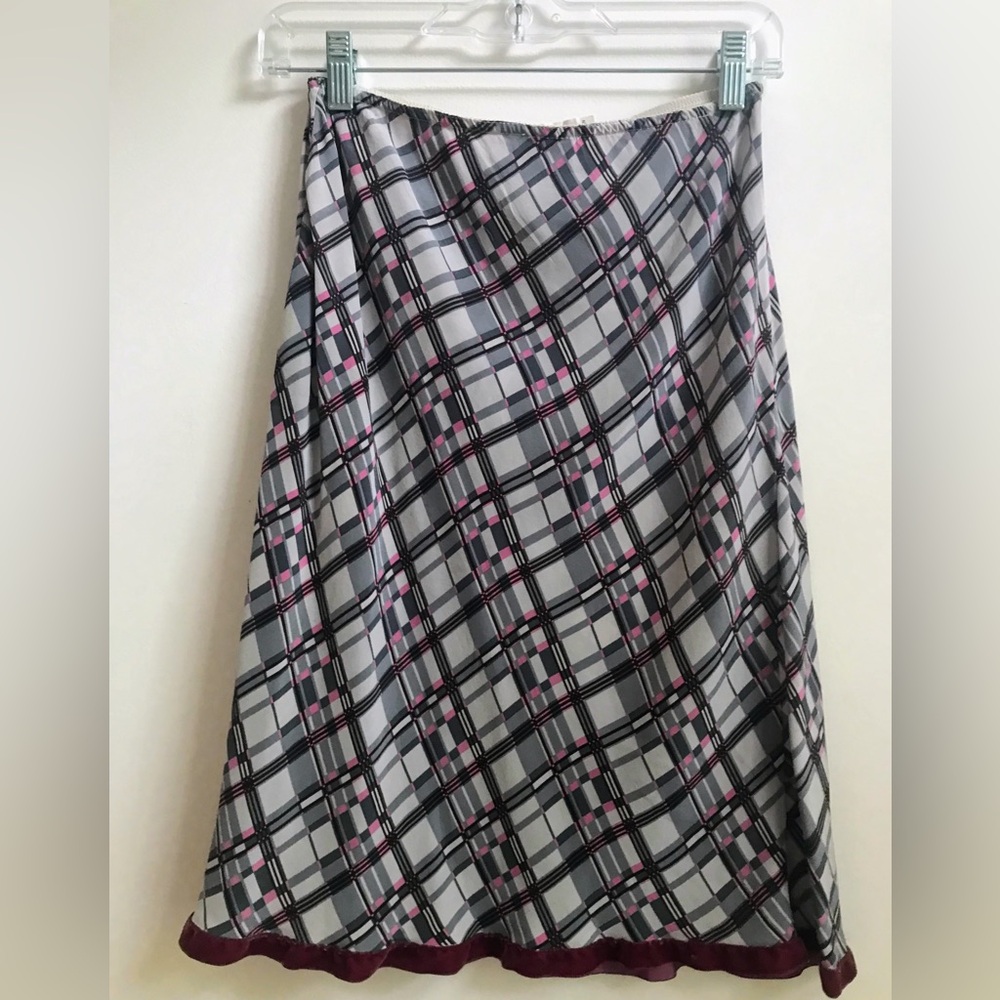 Silk midi skirt with diagonal plaid print and velvet trim.